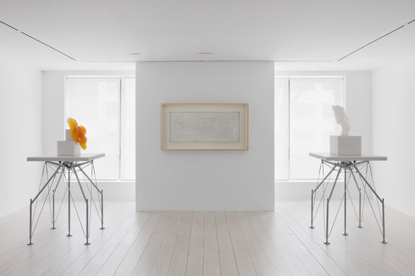From left: Barry X Ball, Baby at the Breast, 2013 - 2019, Translucent golden honeycomb calcite, sculpture/pedestal: 64 3⁄4 x 33 x 33 in (164.6 x 84.1 x 84.1 cm); Cy Twombly, Untitled (New York City),1956, Oil based house paint, wax crayon and pencil on canvas, 26 3⁄4 x 56 in (68 x 142.2 cm); Barry X Ball, Yvette Guilbert, 2013 - 2019, Ultra-translucent white Mexican onyx, sculpture/pedestal: 69 3⁄8 x 33 1⁄8 x 33 1⁄8 in (176.3 x 84 x 84 cm).