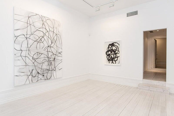 Left: Christopher Wool, Untitled (Jazz Death), 2003, Enamel on linen, 96 x 72 in (243.8 x 182.8 cm); Right: Christopher Wool, Untitled, 1994, Alkyd on aluminum, 43 x 30 in (109.2 x 76.2 cm)