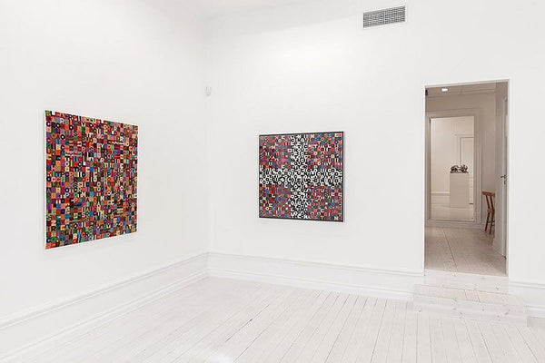 From Left: Alighiero Boetti, Untitled, 1989, Embroidery, 44.875 x 40.9375 inches (114 x 104 cm); Alighiero Boetti, Untitled, 1988, Embroidery, 42 x 43.75 inches (107 x 111 cm).