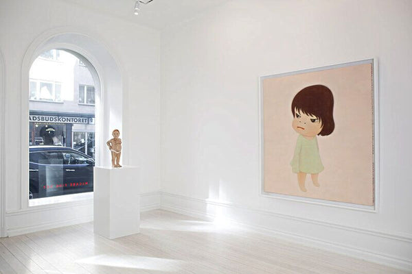 From Left: Claudette Schreuders, The Insider, 2009, Lime wood and enamel paint, 22.5 x 9 x 8.625 inches (57.15 x 23 x 22 cm) (image courtesy of the artist); Yoshitomo Nara, Missing in Action, 2000, Acrylic on canvas, 65 x 58.5 inches (165 x 149 cm)
